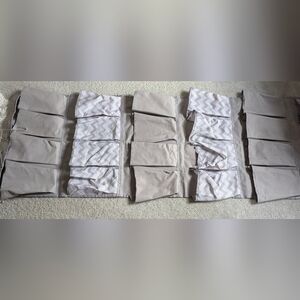 Over-the-door hanging shoe organizer with gray and white chevron pattern